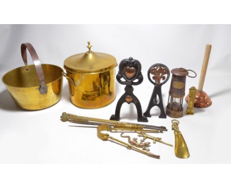 A mixed lot of metalware to include brass coal bucket, fire irons, two fire dogs, shoehorn, model lizards, etc, also a miners