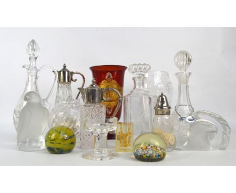 A small group of clear glass including two decanters, two claret jugs, a large ovoid vase cut decorated with birds amongst fo