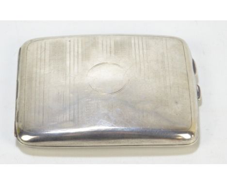 W & CO W; a George V hallmarked silver curved cigarette case with engine turned decoration and vacant circular cartouche, Bir