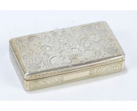 A mid-19th century Austro-Hungarian snuff box of rectangular form with overall engine turned and engraved foliate scroll deco