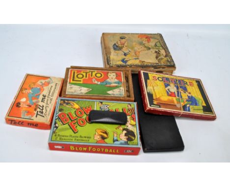 A collection of vintage boxed games including Blow Football, Lotto, Solitaire, plus a pair of pince-nez and a boxed set of do