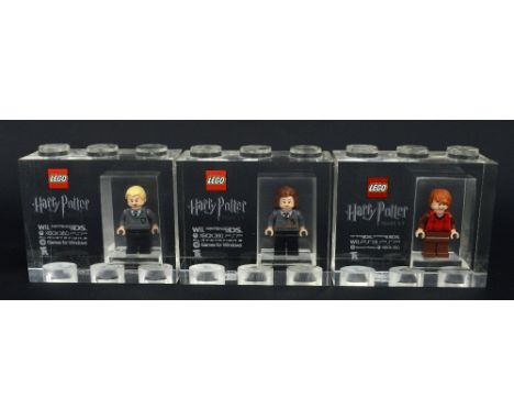 Three Lego for TT Games Minifigure acrylic trophy bricks, Draco Malfoy and Hermione Granger from the Harry Potter Years 1 - 4