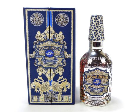 CHIVAS REGAL; a single 70cl boxed limited edition bottle of gold signature scotch whisky, with label and case designed by Chr