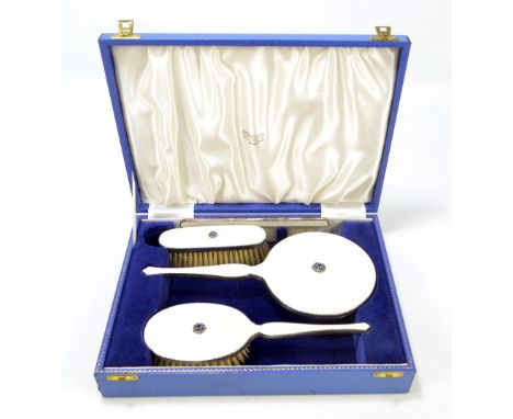 HENRY CLIFFORD DAVIS; a cased Elizabeth II hallmarked silver mounted and guilloche enamel back four piece dressing table set 