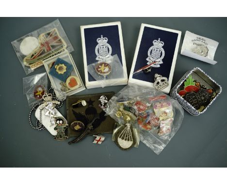 An extensive collection of military and other lapel badges together with two Royal Army sets of cards, military patches etc