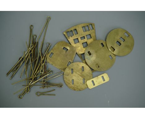 A small quantity of British army badge pins and backing plates