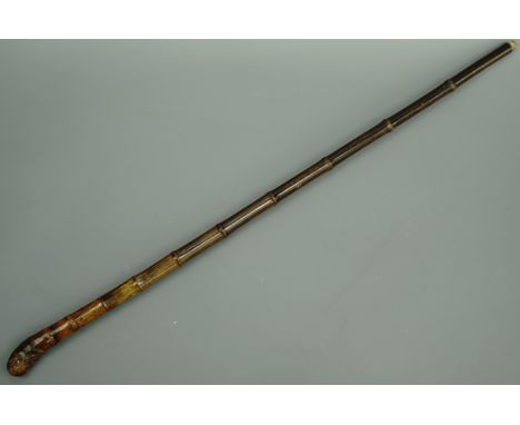A late 19th Century bamboo sword stick, blade 65 cm, 90 cm overall
