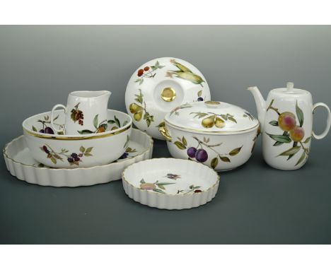A quantity of Royal Worcester Evesham ware including a tureen, large flan dish, 34 cm, two boxed entree dishes, etc 