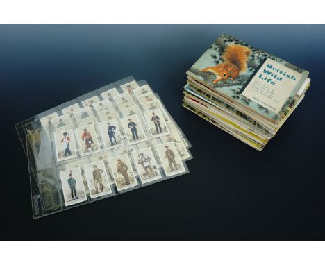 A collection of Brooke Bond tea card albums and cards, together with a set of John Player "Uniforms of the Territorial Army" 