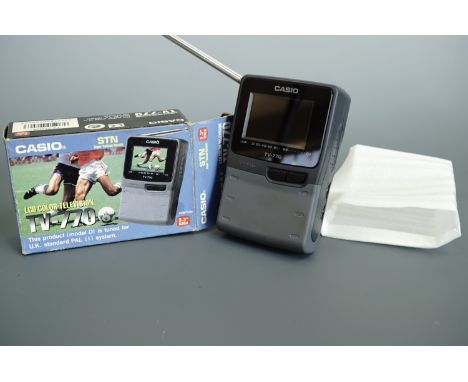 A Casio STN Super Twisted Nematic 2.3" screen LCD colour television, TV-770, in original carton