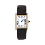 CARTIER Damenarmbanduhr, Tank, in Gelbgold 18K, mit 6 Reihen Diamanten,Handaufzug, mit braunem