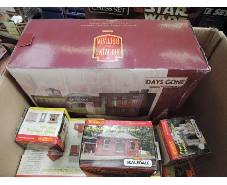 Six Hornby 00 scale Scaledale builings, all boxed and a Days Gone tin brewery