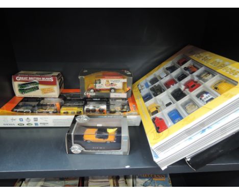 A shelf of modern diecasts including Matchbox Mattel and similar