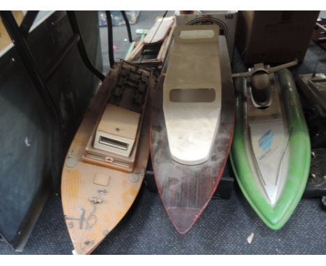 Six radio controlled mixed vintage wooden and plastic model speed boats and similar boats