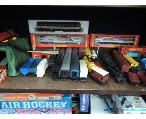 A shelf of Hornby and similar 00 gauge including three Intercity locomotives, two boxed R240 & R268, a diesel locomotive, rol