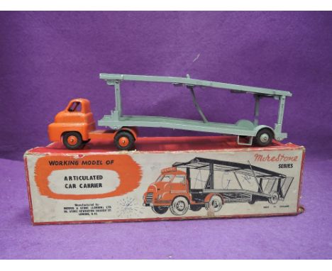 A Morestone series diecast, Car Transporter having orange tractor unit and grey trailer, in original box (af)