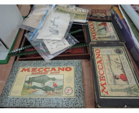 A selection of vintage Meccano part sets including Accessory Outfit 2A,, No2 and No3 all in original boxes along with a woode