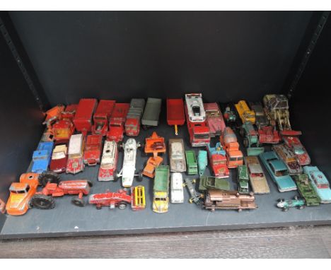 A shelf of mixed diecasts including Techno, Matchbox, Corgi etc