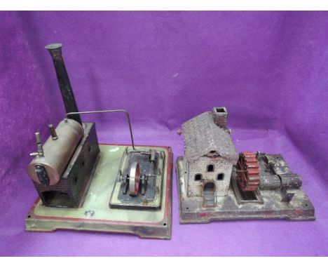 A 1920's Doll & Co live steam plant having horizontal single cylinder engine and brass boiler along with a similar earlier ti