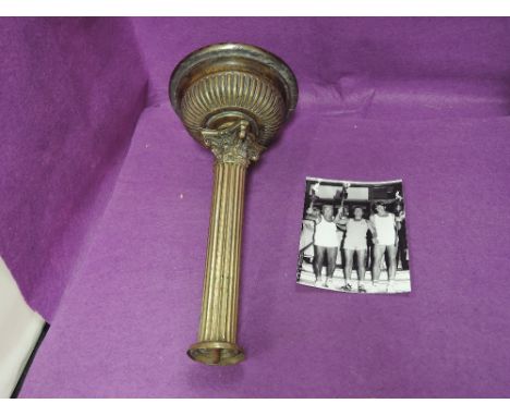 A Victorian brass Corinthian design oil lamp top used as Olympic Athletic torch, with photograph 