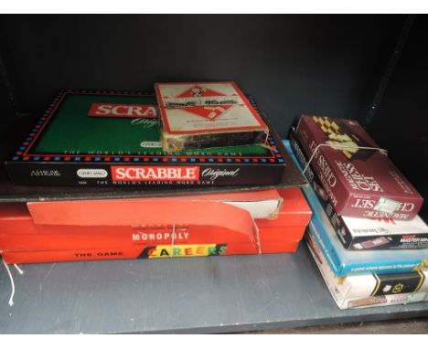 A selection of vintage games including Monopoly, Scrabble, Mastermind etc
