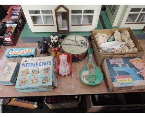 A selection of vintage toys including a Vulcan Junior sewing machine, boxed, Glevum Games Picture Cubes set, clockwork Mickey