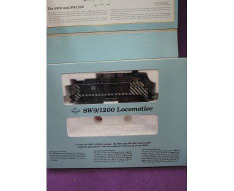 Two Proto 2000 series HO scale locomotives, SW9/1200 Santa Fe 2428 & GP9 Cotton Belt 820 both boxed, 8049 &21741