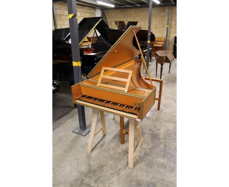 A &amp; A Turner (c1970s) A single manual harpsichord in a beech case on turned legs. AMENDMENT Is together with a stool.
