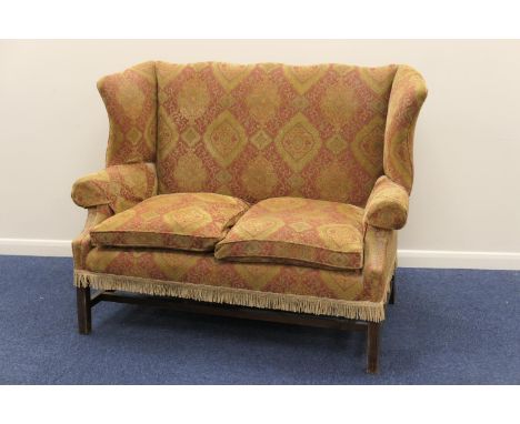 Georgian style tapestry fabric upholstered two seater wing settee, width 145cm, height 113cm, depth 76cm (NB: Condition is NO