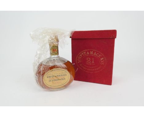 Whyte &amp; Mackay 12 y.o. Scotch whisky, unopened (level mid shoulder), in original red felt box (NB: Condition is NOT noted