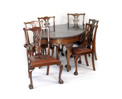 Chippendale Revival mahogany dining room suite, circa 1910, comprising wind out dining table accommodating one extra leaf, 44