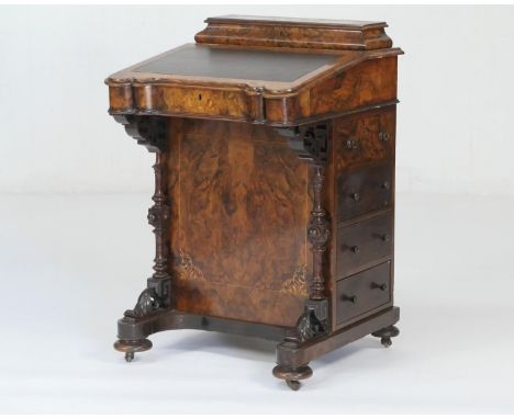 Victorian burr walnut and inlaid davenport, circa 1850-70, the slope front with later rexine writing surface topped with a st