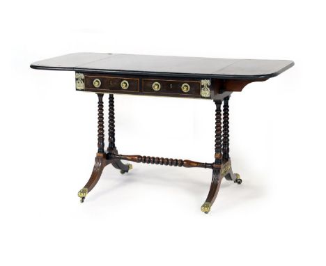 Late Regency rosewood and inlaid sofa table, the top with two drop leaves with brass line inlay, over two frieze drawers with