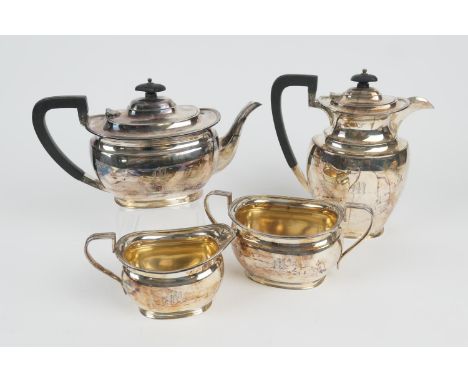 George VI silver four piece tea service, Sheffield 1942, comprising plain slight baluster teapot with ebony finial and handle