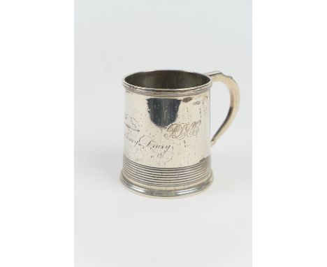 George III Irish silver christening tankard, Dublin 1822, stamped 'M West', tapered cylinder form engraved with a crest featu