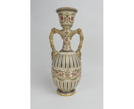 Zsolnay Pecs Persian style vase, twin handled trumpet neck over an ovoid body, fluted and decorated with a band of acanthus a