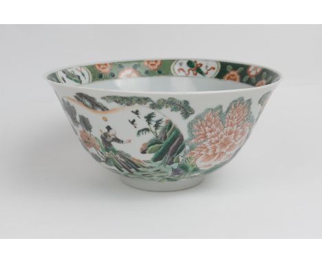 Chinese famille verte bowl, Kangxi (1662-1722), decorated with peony and a calligraphic scroll, 21cm diameter (NB: Condition 
