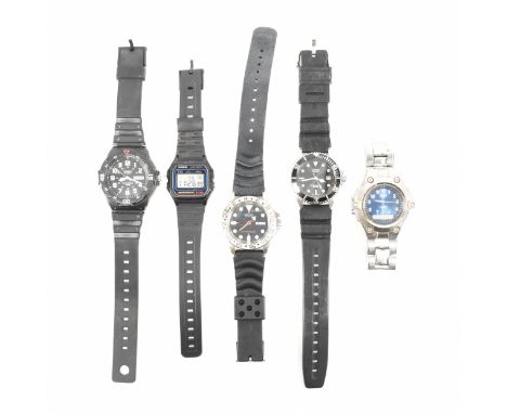 A group of four Casio wrist watches. The lot to include a stainless steel 100m water resist watch, Casio 10 year battery WR 1