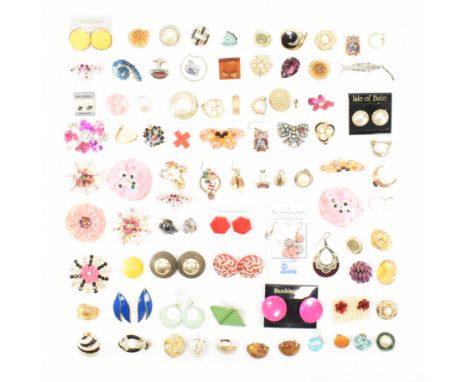 An assorted collection of costume jewellery earrings. The lot to include; enamel, pearls, clip ons, hoops, studs, drop earrin