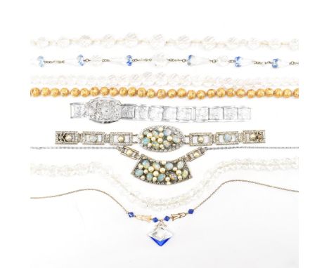 A collection of vintage and antique jewellery. The lot to include gilt wedding beads, mid Century slocum stone necklace and b