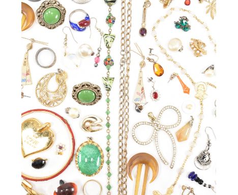 An assorted collection of vintage &amp; later costume jewellery. The lot to include; earrings, necklace pendants, rings, cuff