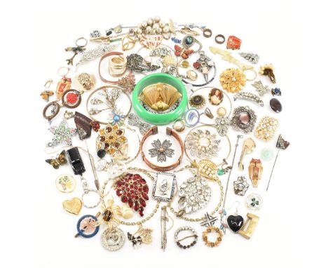 An assorted collection of vintage &amp; later costume jewellery. The lot to include; bangles, bracelets, brooches, necklaces,