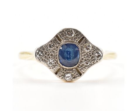 A 1920s 18ct yellow gold, platinum, diamond &amp; sapphire ring. The ring having a central rectangular cut millegrain set sap