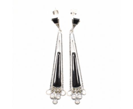 A pair of 925 silver, marcasite &amp; enamel drop earrings. The earrings having elongated panels of black enamel surrounded b