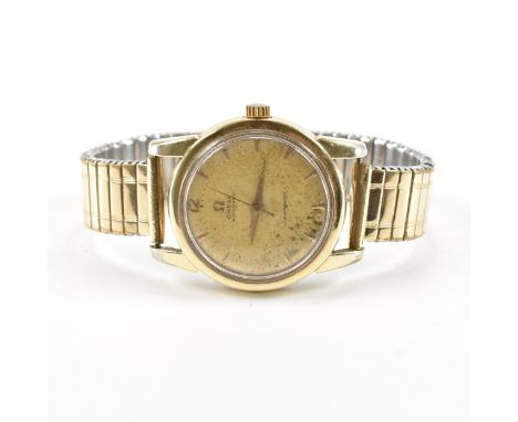 A vintage Omgea seamaster wrist watch. The watch having a round face with faceted arrow hour markings and faceted hands. Move