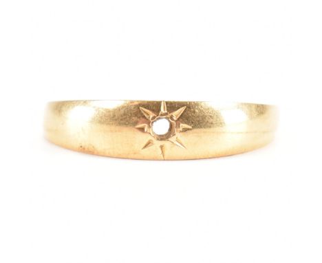 An A/F 18ct yellow gold dome ring. The ring having a central round star setting to a tapered shank, having a break to the bac