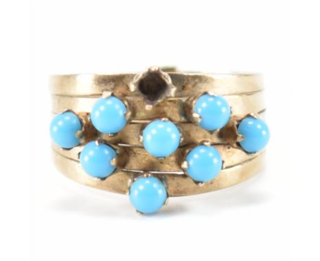 A vintage gold and blue stone five band ring. The ring being set with eight blue stone cabochons (one missing). Marked 14k. W