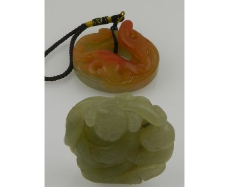 A Chinese jade pendant, in the form of a mother and child, together with a Chinese jade pendant carved with dragon to top. 