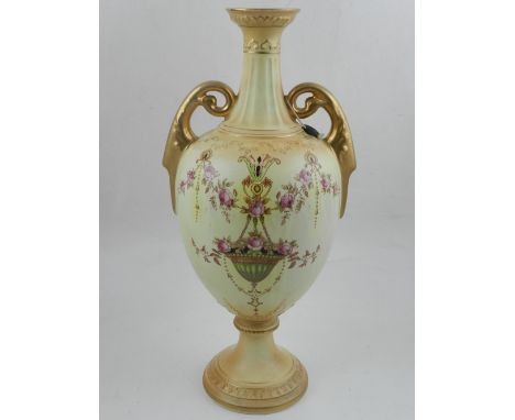 A twin-handled Crown Devon blush ivory vase, with floral decoration, H. 35cm.