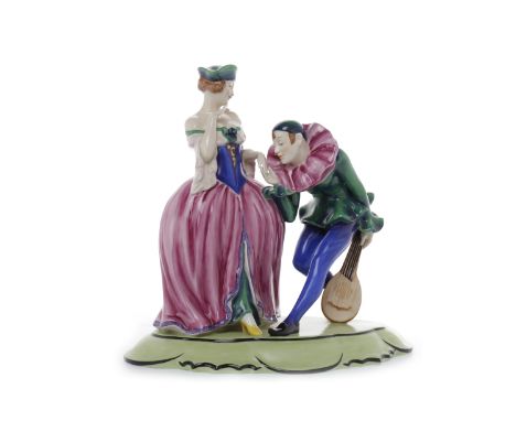 ROYAL DUX FIGURE GROUP OF PIERROT AND A LADYthe jester holding a lute and bowing to kiss the lady's hand, raised on a moulded